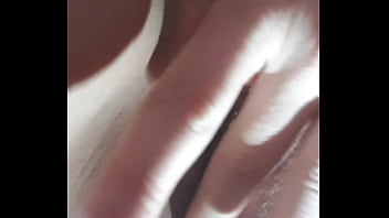Portuguese woman filmed close-up masturbation of her shaved vagina